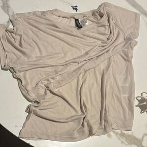 Forever 21 Light Beige top size XL the top is XL but I’m Medium and works for me
